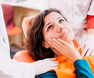 Woman visiting an emergency dentist in Portland